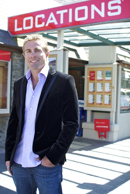 Justin Marshall in front of the Locations Realty office in Queenstown